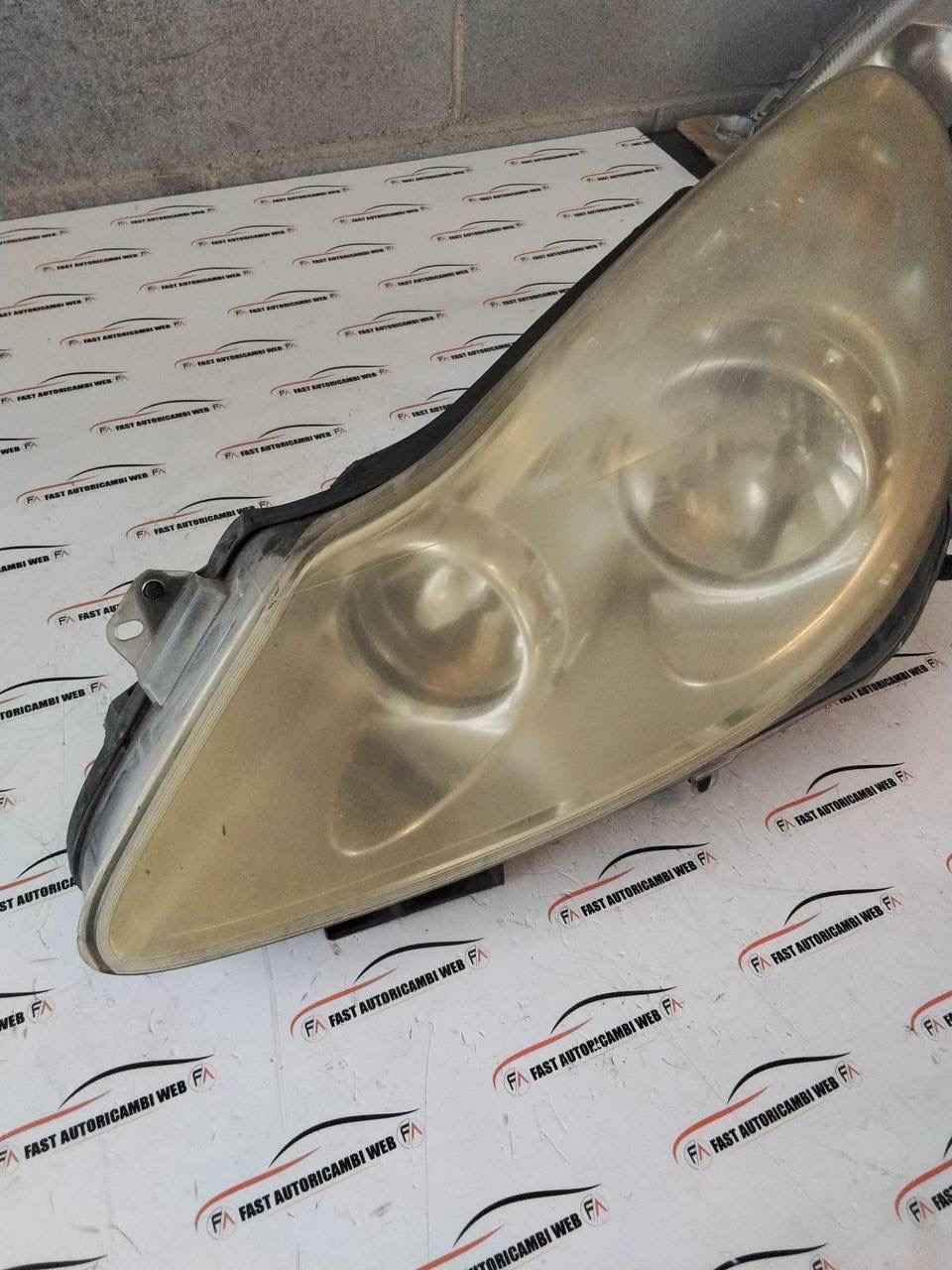 Faro anteriore sinistro Opel Corsa D (2006-14) 13186381 2 IMG_8671